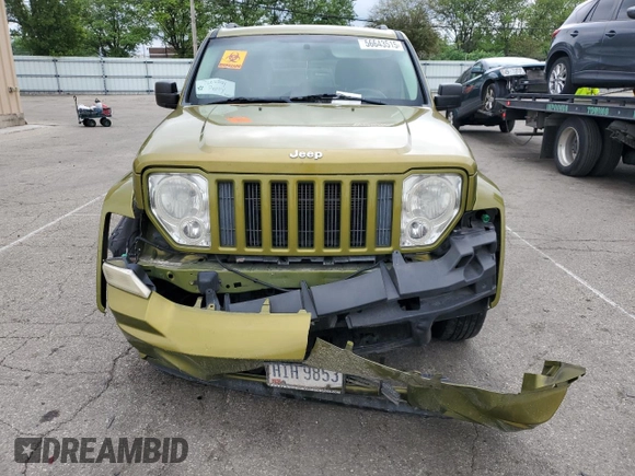 2012 Jeep Liberty Sport z VIN 1C4PJMAK4CW146311, wystawiony jako Copart lot #56643515 z przebiegiem 137 432 mil mil oraz Szkoda całkowita • Salvage title. Historia ofert i sprzedaży dostępna na DreamBid. Obrazek 5.