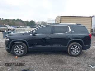 2021 GMC Acadia SLT with VIN 1GKKNMLS0MZ209789, listed as a IAAI auction lot 41521978 with 104,690 mi miles. Bid and sale history available at carsss.com. Image 14.