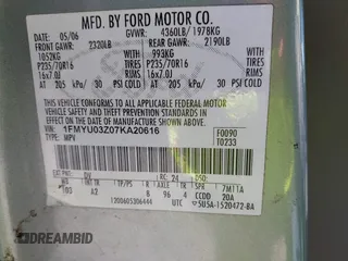 2007 Ford Escape XLT with VIN 1FMYU03Z07KA20616, listed as a IAAI auction lot 41567658 with 142,907 mi miles. Bid and sale history available at carsss.com. Image 9.