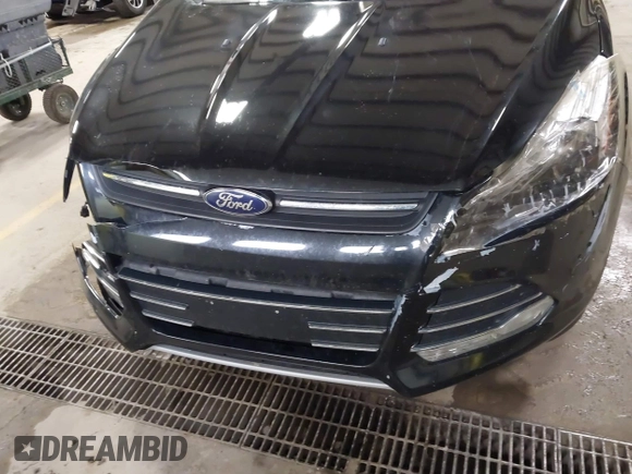 2015 Ford Escape SE with VIN 1FMCU9G9XFUA70029, listed as a IAAI auction lot 41673827 with 82,043 mi miles. Bid and sale history available at carsss.com. Image 13.