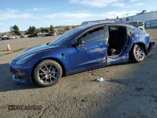 2022 Tesla Model 3 Long Range with VIN 5YJ3E1EB6NF255730, listed as a Copart auction lot 46354235 with 58,470 mi miles and Salvage Title. Bid and sale history available at DreamBid. Image 1.