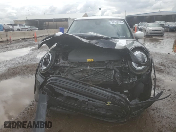 2023 MINI Hardtop Cooper SE z VIN WMW13DJ01P2U19472, wystawiony jako Copart lot #59630715 z przebiegiem 7 304 mil mil oraz Szkoda całkowita • Salvage title. Historia ofert i sprzedaży dostępna na DreamBid. Obrazek 5.
