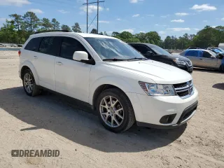 2015 Dodge Journey SXT with VIN 3C4PDCBB2FT651158, listed as a Copart auction lot 52982285 with 130,546 mi miles and Salvage Title. Bid and sale history available at carsss.com. Image 4.