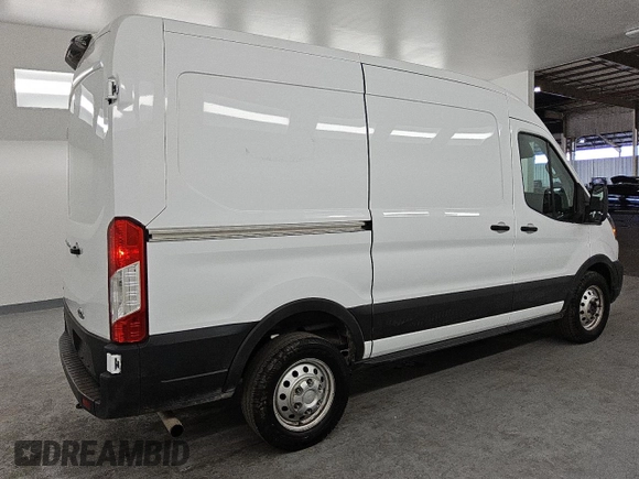 2023 Ford Transit Cargo with VIN 1FTBR2C88PKB34880, listed as a Copart auction lot 43930185 with 31,087 mi miles and Clean title. Bid and sale history available at DreamBid. Image 3.