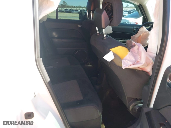 2014 Jeep Patriot Sport with VIN 1C4NJPBA9ED889186, listed as a IAAI auction lot 41738524 with 159,755 mi miles. Bid and sale history available at carsss.com. Image 8.
