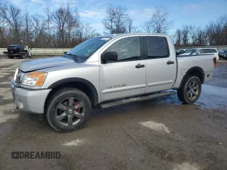 2015 Nissan Titan Pro-4X with VIN 1N6AA0EC1FN512072, listed as a Copart auction lot 85733174 with 92,460 mi miles and Salvage title. Bid and sale history available at DreamBid. Image 1.