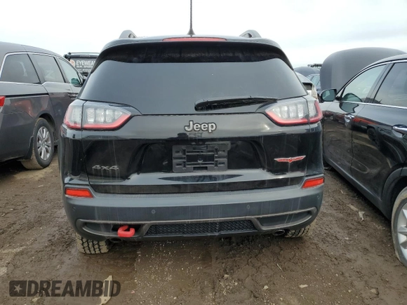 2019 Jeep Cherokee Trailhawk with VIN 1C4PJMBXXKD127749, listed as a Copart auction lot 50035205 with Not Provided miles and Salvage Title. Bid and sale history available at DreamBid. Image 6.