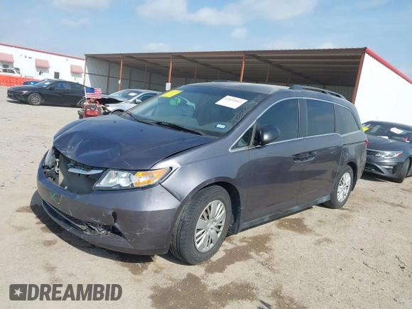 2015 Honda Odyssey LX with VIN 5FNRL5H29FB032327, listed as a IAAI auction lot 42052043 with 153,365 mi miles and . Bid and sale history available at DreamBid. Image 2.