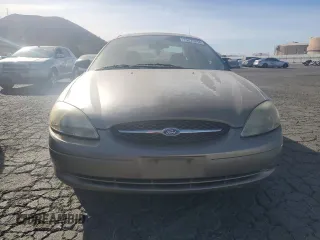 2003 Ford Taurus SEL Deluxe with VIN 1FAFP56S23G221922, listed as a Copart auction lot 79673294 with 142,911 mi miles and Salvage Title. Bid and sale history available at DreamBid. Image 5.