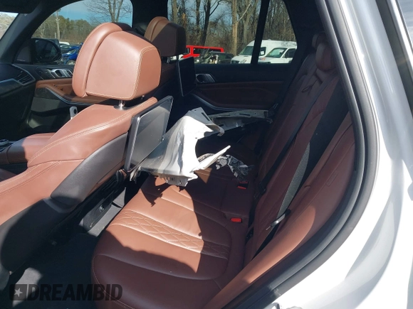2020 BMW X5 M50i with VIN 5UXJU4C06LLE45651, listed as a IAAI auction lot 41618355 with 70,885 mi miles and . Bid and sale history available at DreamBid. Image 8.