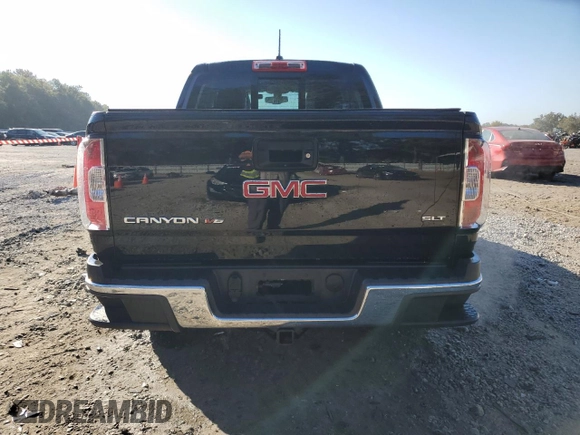2018 GMC Canyon 4WD SLT with VIN 1GTG6DEN4J1296628, listed as a Copart auction lot 77135484 with 74,486 mi miles and Salvage Title. Bid and sale history available at carsss.com. Image 6.
