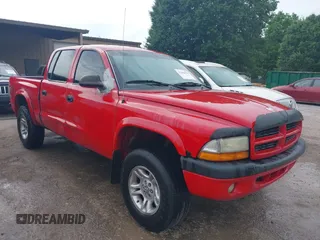 2003 Dodge Dakota Sport z VIN 1D7HG38X03S333959, wystawiony jako IAAI lot #42306578 z przebiegiem 298 949 mil mil oraz . Historia ofert i sprzedaży dostępna na DreamBid. Obrazek 1.