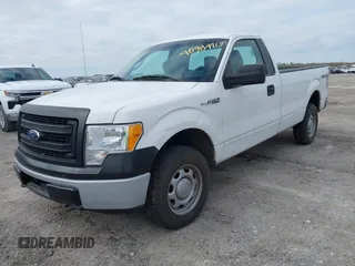 2013 Ford F-150 XL with VIN 1FTMF1EM1DKF11213, listed as a IAAI auction lot 40984100 with 117,793 mi miles and . Bid and sale history available at carsss.com. Image 2.