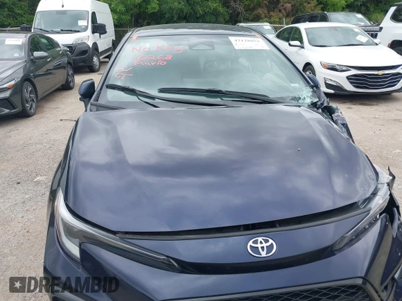 2024 Toyota Corolla SE with VIN JTDS4MCE5RJ103854, listed as a IAAI auction lot 42128851 with 53,379 mi miles. Bid and sale history available at carsss.com. Image 11.