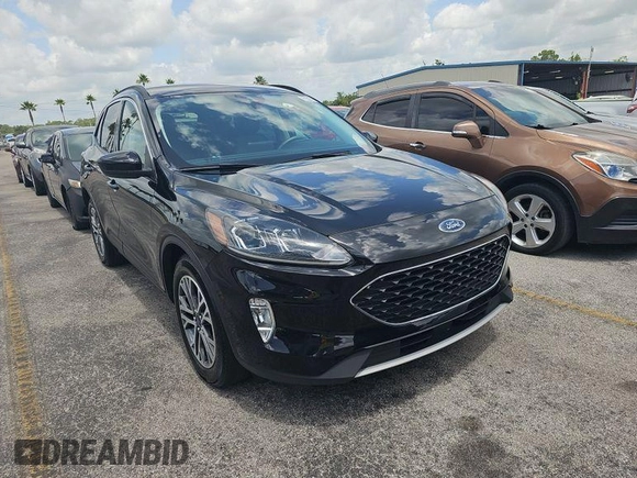 2021 Ford Escape SEL Hybrid with VIN 1FMCU0CZ4MUA54097, listed as a IAAI auction lot 42566428 with 45,342 mi miles and . Bid and sale history available at DreamBid. Image 7.
