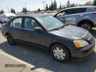 2001 Honda Civic DX with VIN 2HGES16261H588886, listed as a Copart auction lot 53163734 with 193,104 mi miles and Salvage Title. Bid and sale history available at carsss.com. Image 4.