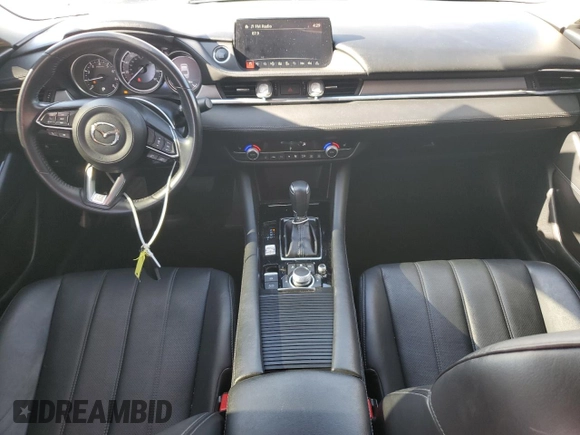 2021 Mazda 6 Touring with VIN JM1GL1VM0M1612027, listed as a Copart auction lot 48262185 with 67,568 mi miles and Salvage Title. Bid and sale history available at DreamBid. Image 8.