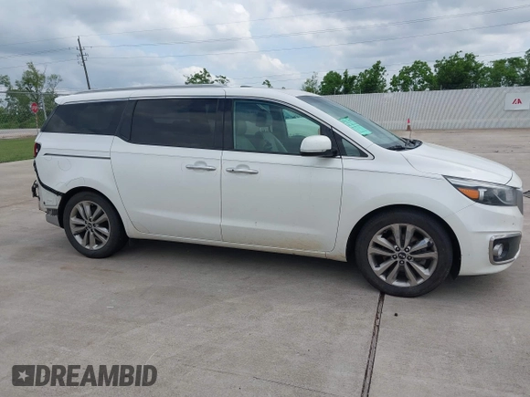 2015 Kia Sedona SX-L with VIN KNDME5C12F6028893, listed as a IAAI auction lot 42109514 with 169,303 mi miles and . Bid and sale history available at DreamBid. Image 13.