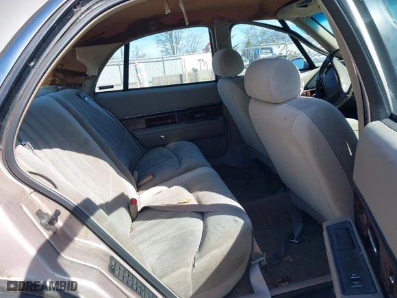 1999 Buick LeSabre Custom with VIN 1G4HP52K8XH446950, listed as a IAAI auction lot 41826498 with 144,504 mi miles. Bid and sale history available at carsss.com. Image 8.