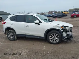 2014 Mazda CX-5 Sport with VIN JM3KE2BE8E0422322, listed as a IAAI auction lot 42009499 with 166,966 mi miles and . Bid and sale history available at carsss.com. Image 14.