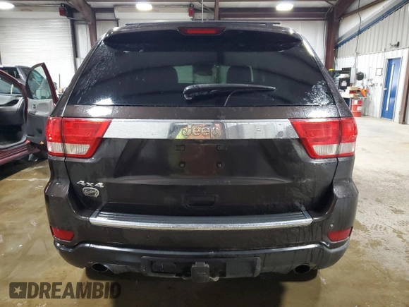 2013 Jeep Grand Cherokee Overland with VIN 1C4RJFCT7DC587329, listed as a Copart auction lot 53432625 with 98,938 mi miles and Salvage Title. Bid and sale history available at carsss.com. Image 6.