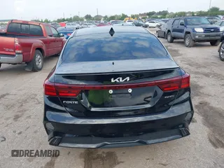 2023 Kia Forte GT-Line z VIN 3KPF54AD8PE542078, wystawiony jako IAAI lot #42113560 z przebiegiem 29 373 mil mil oraz . Historia ofert i sprzedaży dostępna na DreamBid. Obrazek 16.