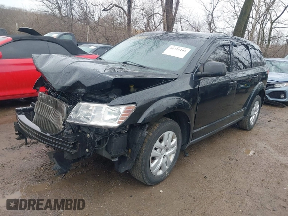 2014 Dodge Journey SE with VIN 3C4PDCAB8ET151666, listed as a IAAI auction lot 41721164 with 262,991 mi miles and . Bid and sale history available at carsss.com. Image 17.