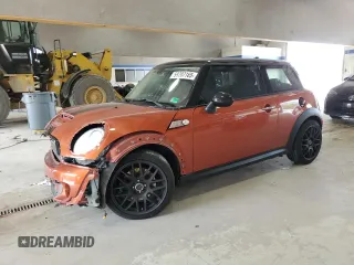 2013 MINI Hardtop S with VIN WMWSV3C52DT396176, listed as a Copart auction lot 59207165 with 104,194 mi miles and Salvage title. Bid and sale history available at DreamBid. Image 1.