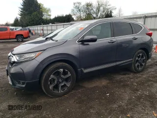 2017 Honda CR-V Touring with VIN 2HKRW2H90HH657450, listed as a Copart auction lot 52821895 with 154,801 mi miles and Salvage Title. Bid and sale history available at carsss.com. Image 1.