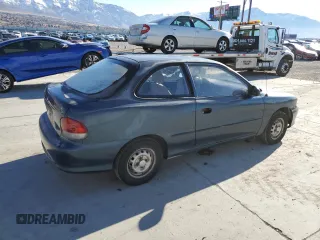 1999 Hyundai Accent z VIN KMHVD14N3XU456921, wystawiony jako Copart lot #44805175 z przebiegiem 112 134 mil mil oraz Tytuł czysty. Historia ofert i sprzedaży dostępna na DreamBid. Obrazek 3.