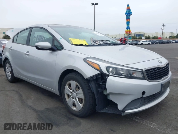 2017 Kia Forte LX with VIN 3KPFK4A74HE100015, listed as a IAAI auction lot 41894601 with 73,945 mi miles and . Bid and sale history available at carsss.com. Image 1.