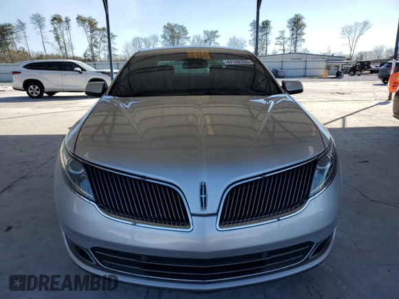 2014 Lincoln MKS z VIN 1LNHL9DK4EG600914, wystawiony jako Copart lot #47142225 z przebiegiem 183 024 mil mil oraz Czysty tytuł • Clean title. Historia ofert i sprzedaży dostępna na DreamBid. Obrazek 5.