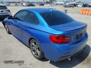 2014 BMW 2 Series M235i with VIN WBA1J7C52EVW84588, listed as a IAAI auction lot 42490194 with 103,998 mi miles and . Bid and sale history available at DreamBid. Image 3.