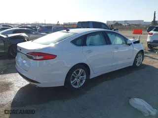 2018 Ford Fusion Hybrid SE with VIN 3FA6P0LU7JR188124, listed as a IAAI auction lot 41760184 with 74,731 mi miles. Bid and sale history available at carsss.com. Image 4.