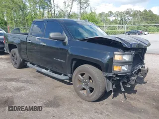 2015 Chevrolet Silverado 1500 LS with VIN 1GCRCPEH4FZ411072, listed as a IAAI auction lot 42083203 with 75,372 mi miles and . Bid and sale history available at DreamBid. Image 1.