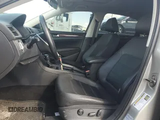 2014 Volkswagen Passat SE z VIN 1VWBT7A3XEC038811, wystawiony jako Copart lot #55198795 z przebiegiem 119 497 mil mil oraz Szkoda całkowita • Salvage title. Historia ofert i sprzedaży dostępna na DreamBid. Obrazek 7.