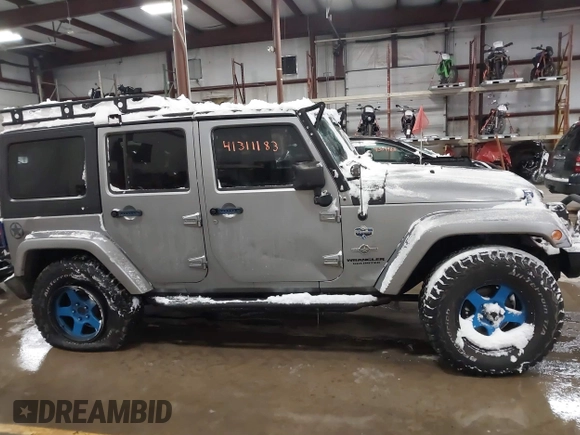 2013 Jeep Wrangler Unlimited Sport z VIN 1C4BJWDG3DL628784, wystawiony jako IAAI lot #41311183 z przebiegiem 125 118 mil mil oraz . Historia ofert i sprzedaży dostępna na DreamBid. Obrazek 13.