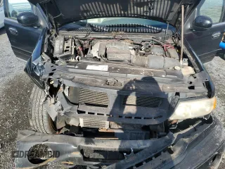 2001 Lincoln Navigator z VIN 5LMFU28R01LJ32925, wystawiony jako Copart lot #83013504 z przebiegiem 132 750 mil mil oraz Szkody całkowita. Historia ofert i sprzedaży dostępna na DreamBid. Obrazek 13.