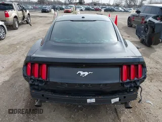 2017 Ford Mustang EcoBoost z VIN 1FA6P8TH3H5351723, wystawiony jako IAAI lot #41883990 z przebiegiem 120 520 mil mil oraz . Historia ofert i sprzedaży dostępna na DreamBid. Obrazek 17.
