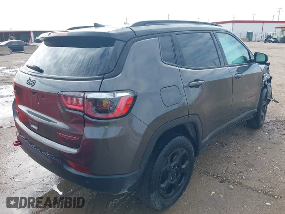 2023 Jeep Compass Trailhawk with VIN 3C4NJDDN9PT544283, listed as a IAAI auction lot 42393021 with 60,009 mi miles and . Bid and sale history available at DreamBid. Image 4.