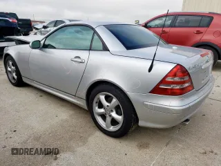 2003 Mercedes-Benz SLK 320 with VIN WDBKK65F73F284794, listed as a Copart auction lot 55833335 with 90,033 mi miles and Salvage title. Bid and sale history available at DreamBid. Image 2.