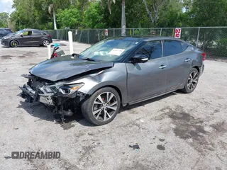 2016 Nissan Maxima SR with VIN 1N4AA6AP4GC426126, listed as a IAAI auction lot 42417796 with 120,274 mi miles and . Bid and sale history available at DreamBid. Image 2.