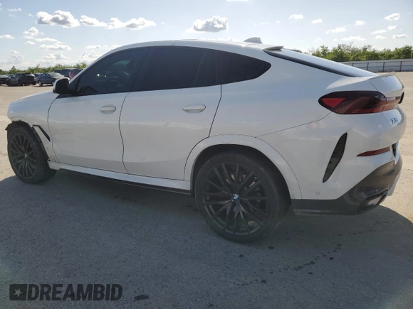 2023 BMW X6 xDrive40i z VIN 5UXCY6C04P9P49005, wystawiony jako Copart lot #51974695 z przebiegiem 30 421 mil mil oraz Szkoda całkowita • Salvage title. Historia ofert i sprzedaży dostępna na DreamBid. Obrazek 2.