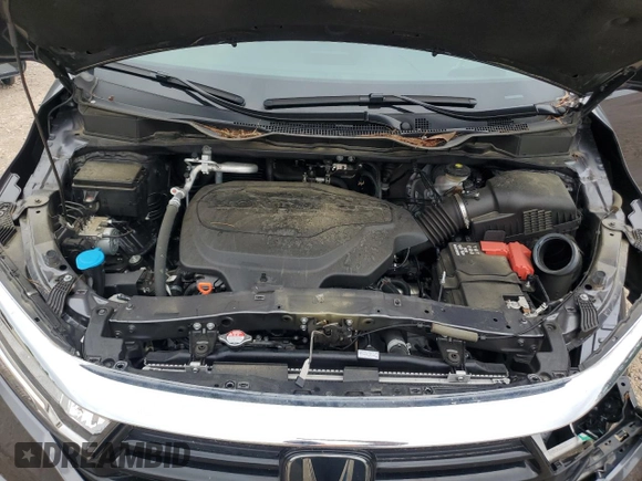 2023 Honda Odyssey Touring with VIN 5FNRL6H86PB024066, listed as a Copart auction lot 58414575 with 29,827 mi miles and Salvage title. Bid and sale history available at DreamBid. Image 12.