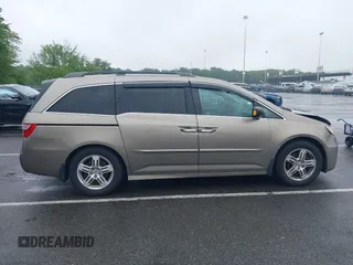 2012 Honda Odyssey Touring с VIN 5FNRL5H98CB060421, выставлен на аукционе IAAI как лот 42378822 с пробегом 249 128 миль миль и . История ставок и продаж доступна на DreamBid. Изображение 13.