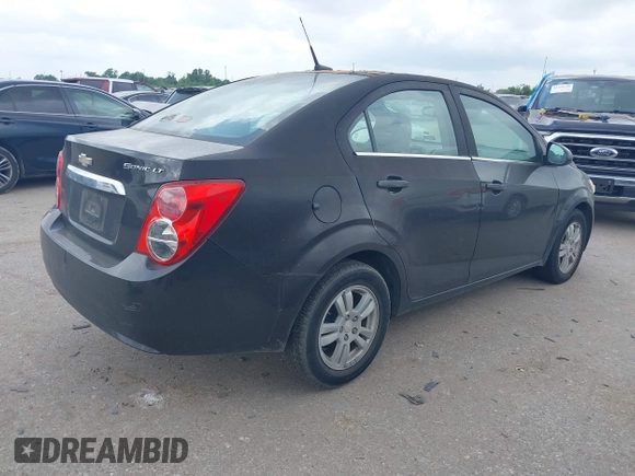 2013 Chevrolet Sonic LT with VIN 1G1JC5SH3D4255079, listed as a IAAI auction lot 42167910 with Not Provided miles and . Bid and sale history available at DreamBid. Image 4.