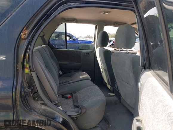 2001 Isuzu Rodeo S with VIN 4S2CK58W114363340, listed as a IAAI auction lot 41498698 with 185,408 mi miles and . Bid and sale history available at DreamBid. Image 8.