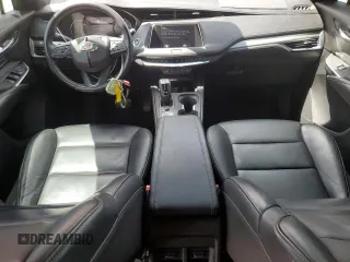 2019 Cadillac XT4 FWD Premium Luxury with VIN 1GYFZCR41KF183507, listed as a Copart auction lot 61581215 with 64,803 mi miles and Salvage title. Bid and sale history available at DreamBid. Image 8.