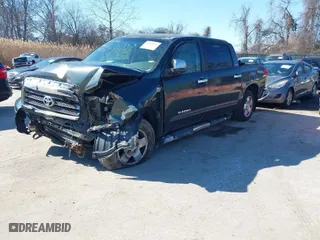 2007 Toyota Tundra LTD with VIN 5TBDV58167S464519, listed as a IAAI auction lot 41569216 with 311,460 mi miles. Bid and sale history available at carsss.com. Image 2.