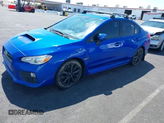 2015 Subaru WRX Premium with VIN JF1VA1D60F9830818, listed as a IAAI auction lot 40010134 with 120,575 mi miles and . Bid and sale history available at DreamBid. Image 2.